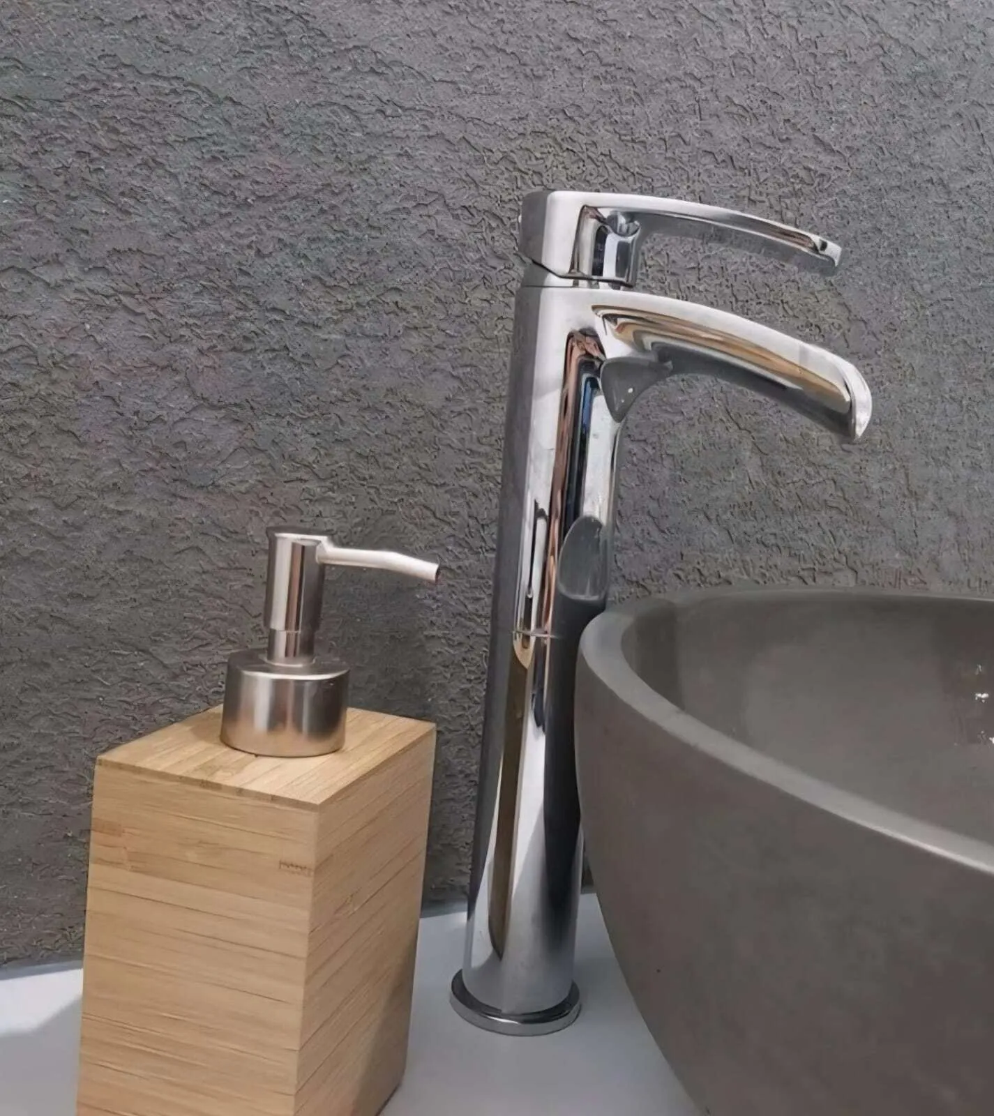 Textured Venetian plaster bathroom wall with vessel sink